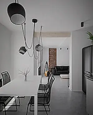 Open concept white kitchen with minimalist decoration